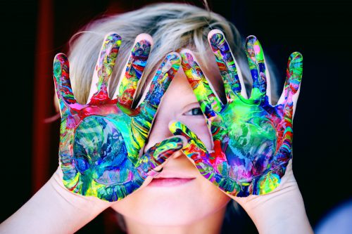 boy with painted hands