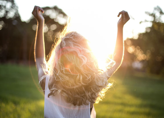 Girl playing in a field