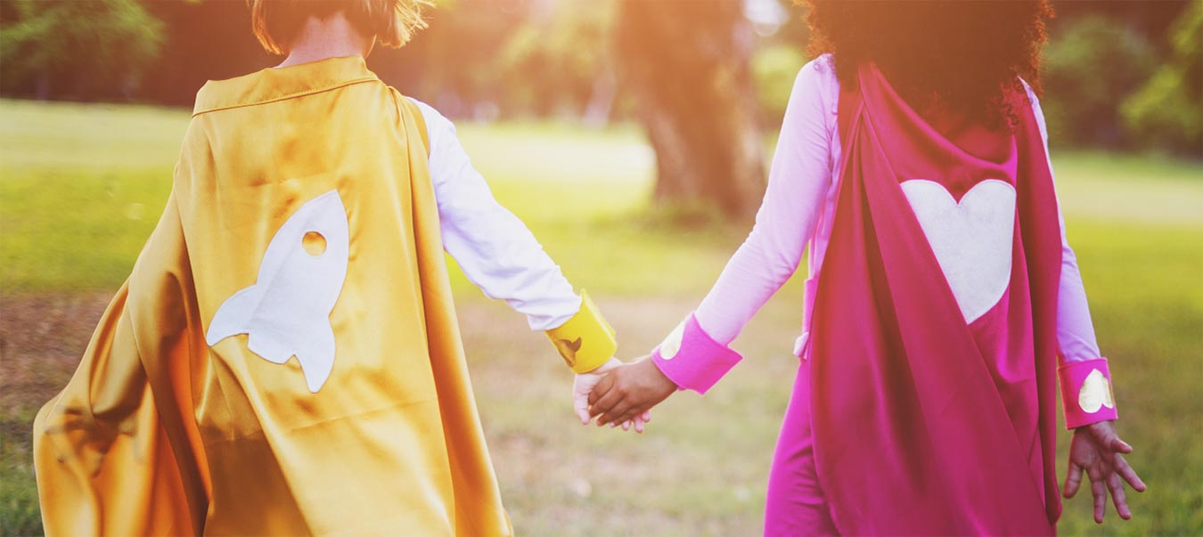 Kids walking while holding hands